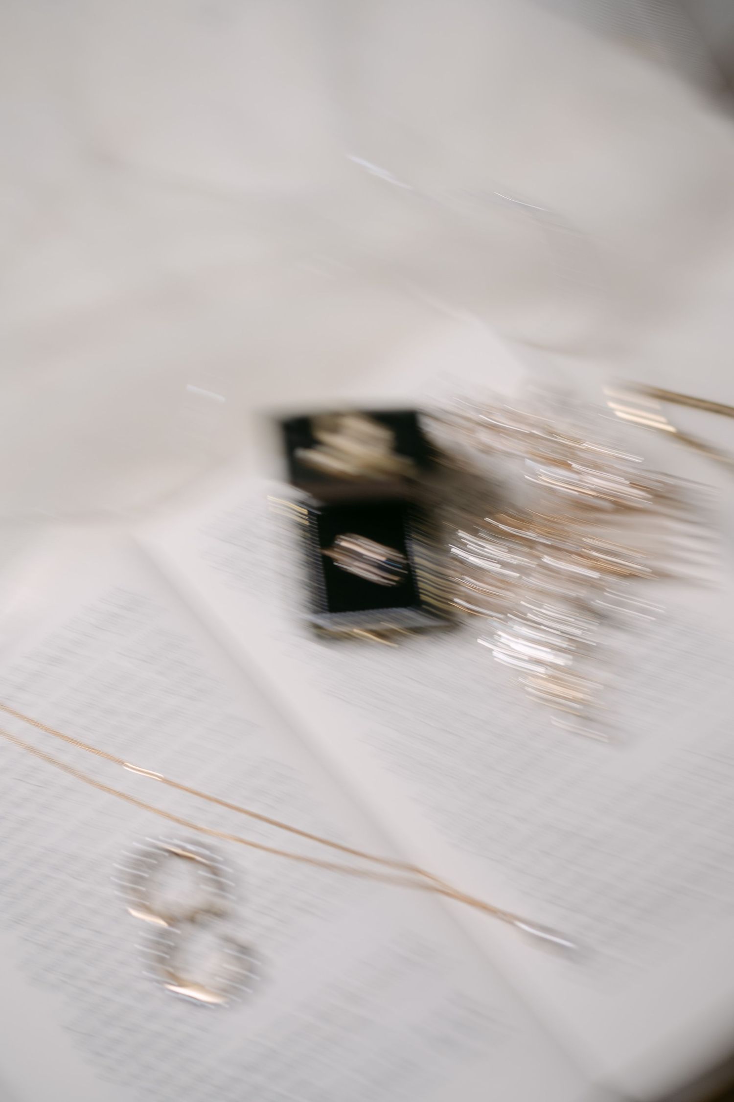 Abstract motion blur of wedding details in soft focus creating an artistic effect.