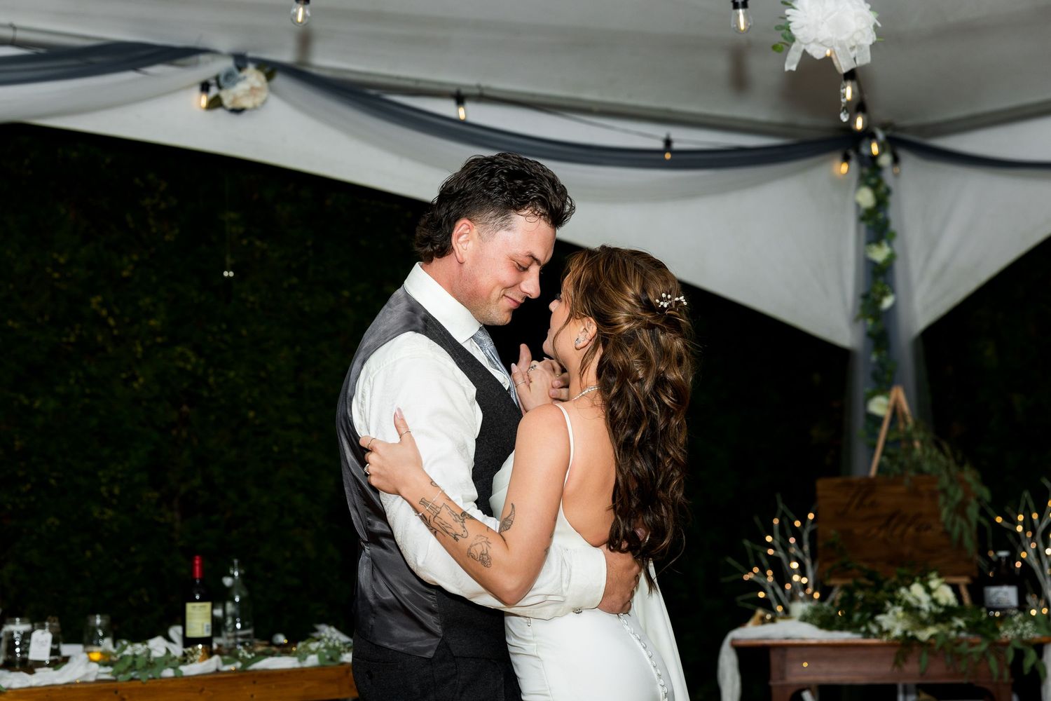 Luxury wedding photo of bride and groom sharing their first dance, capturing romantic, intimate, and stylish wedding photography moments.