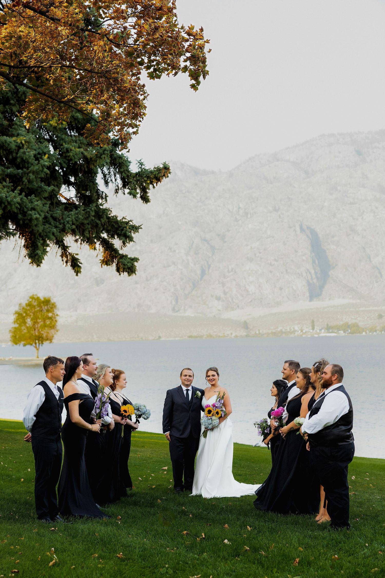Luxury photo of bridal party at Watermark Beach Resort, capturing stylish, joyful, and elegant group portraits for destination weddiings.