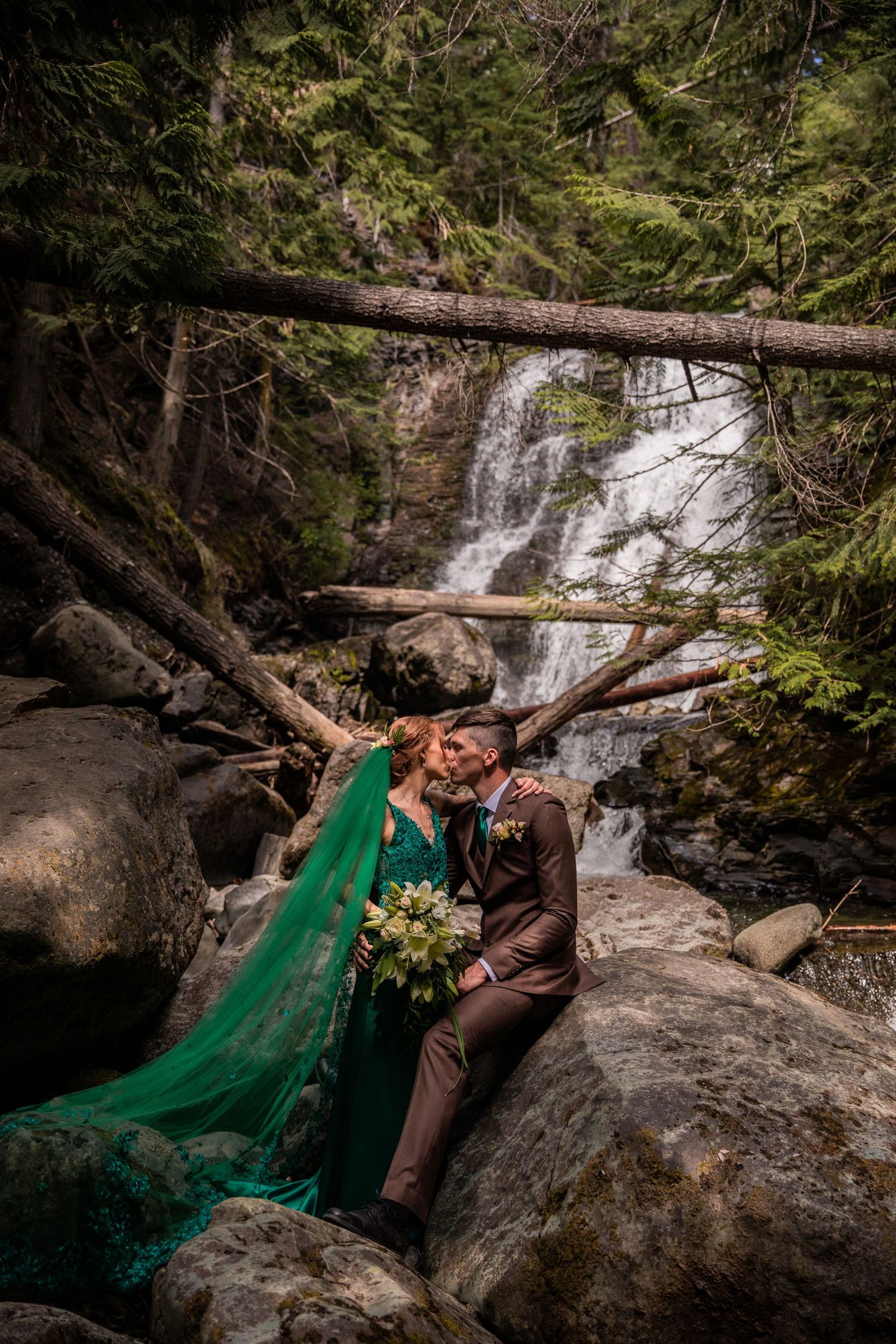 Elopement photo taken at Whitecroft Falls, near Sun Peaks BC.
