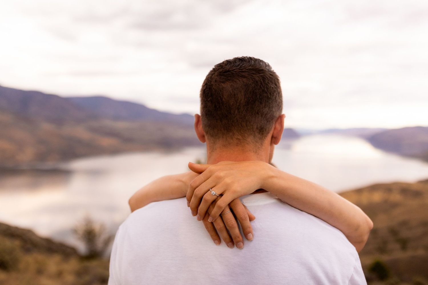 Engagement photo taken at the Kamloops Lake lookout and viewpoint on Six Mill Hill near Kamloops BC and Savona BC.