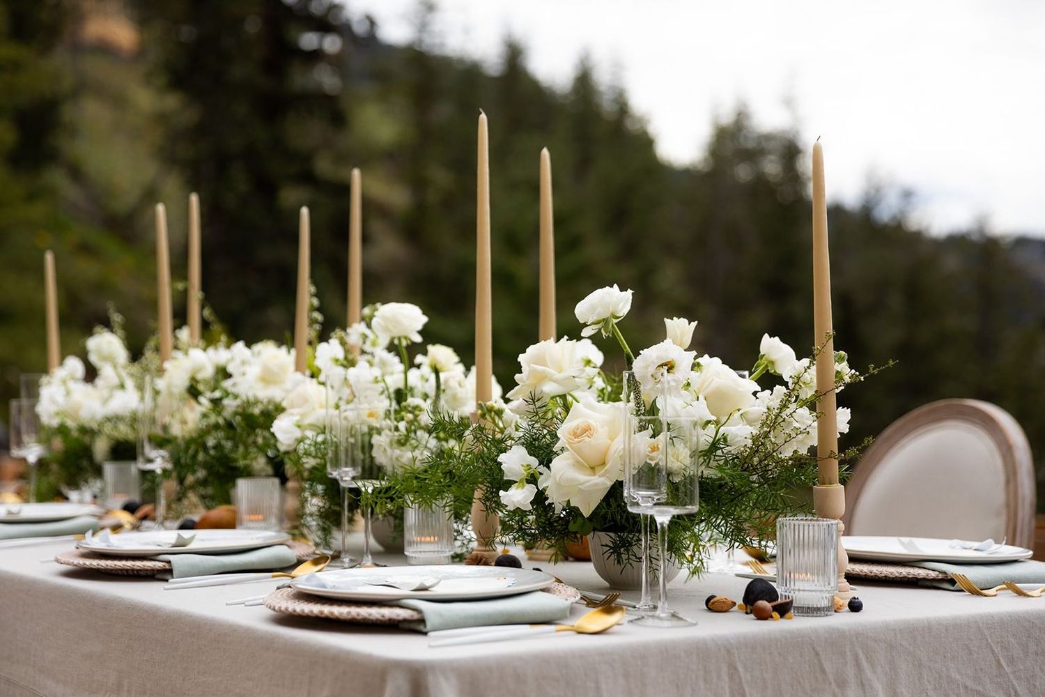 Outdoor wedding reception table in the Okanagan forest.