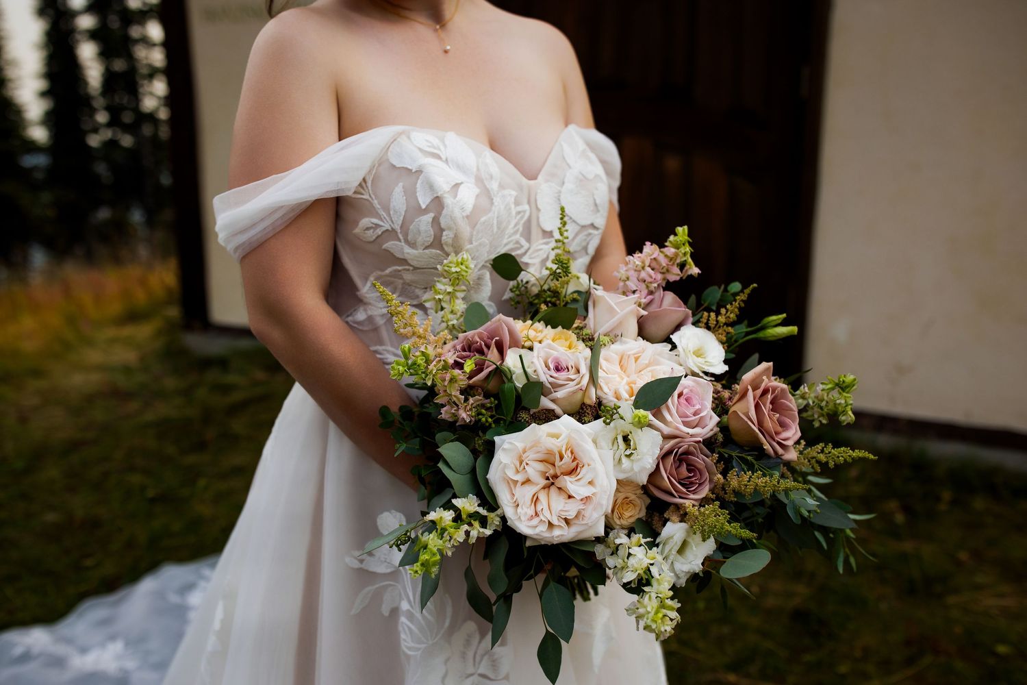 Luxury wedding photo of bride’s bouquet at Sun Peaks Resort, showcasing vibrant florals, elegant wedding details, and stylish destination ph
