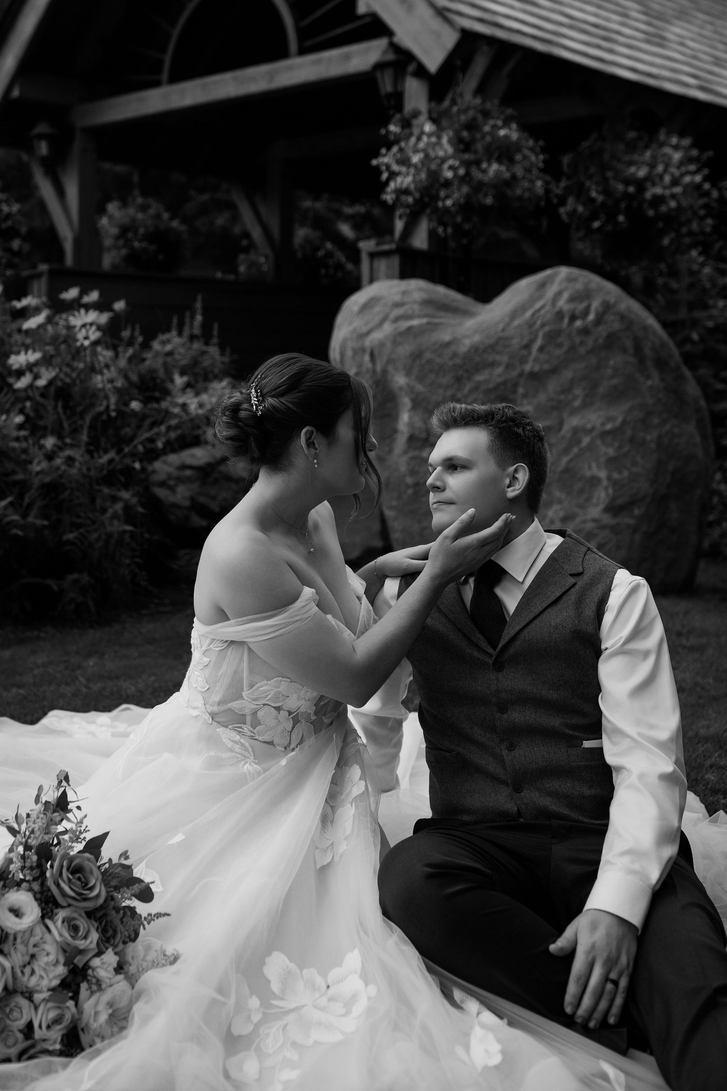 Couple shares an intimate moment during their portraits at Sun Peaks Resort following their mountain-top wedding ceremony.