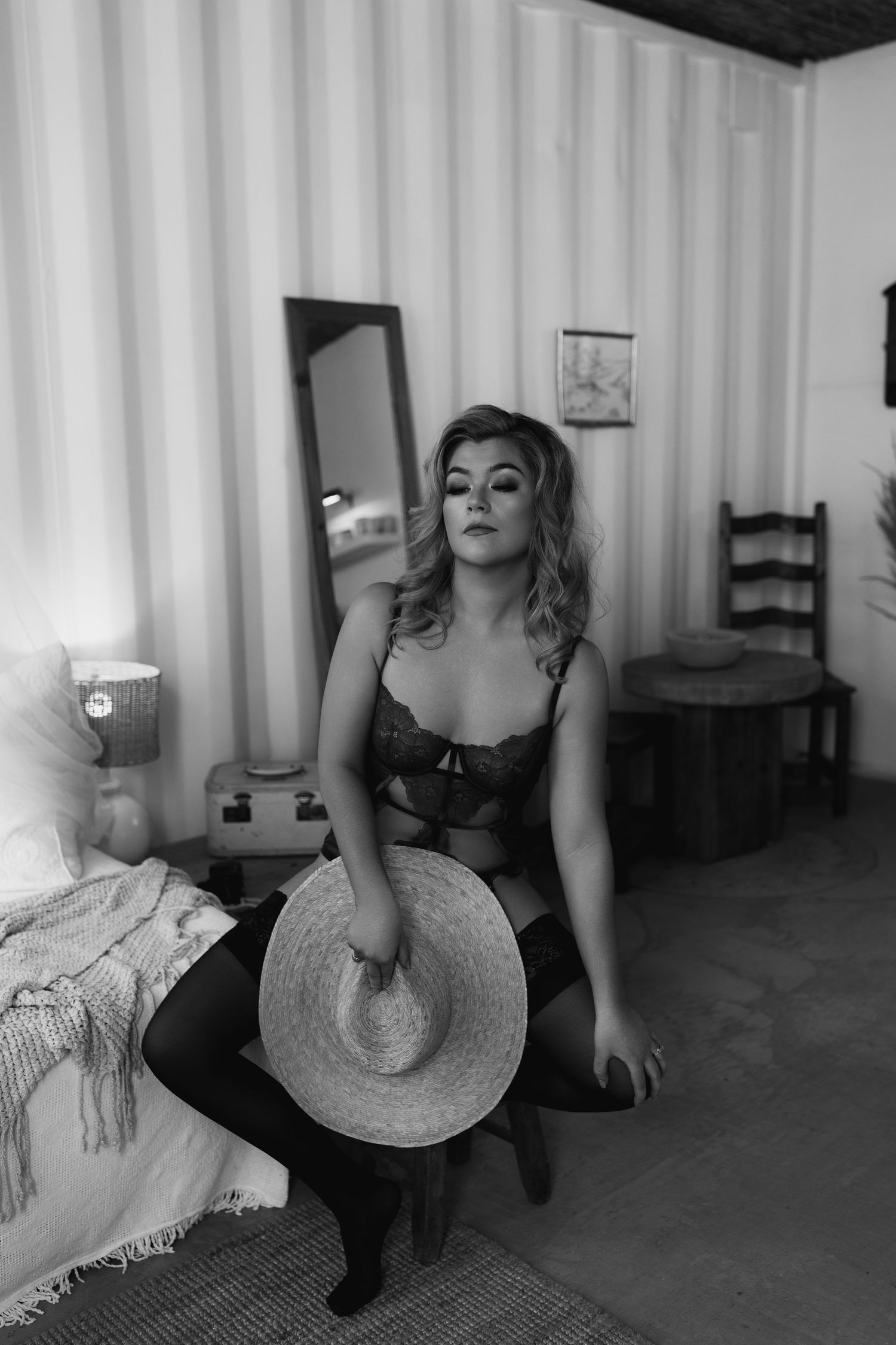 Luxury boudoir photo of woman in studio, capturing intimate, empowering, and stylish personal branding and boudoir photography.