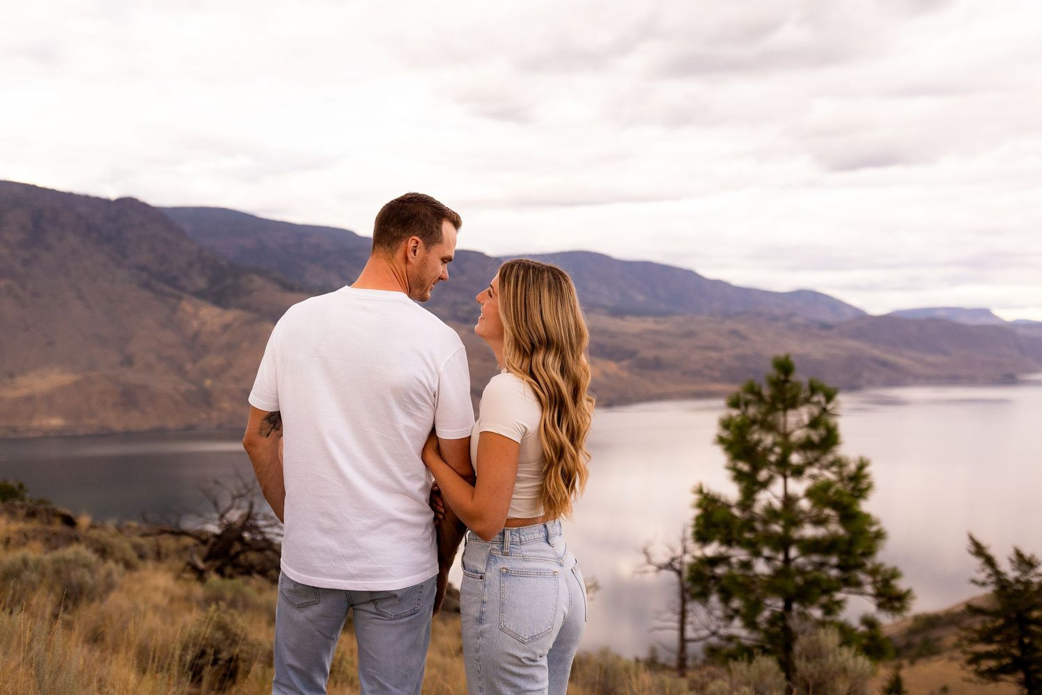 Engagement photo taken at the Kamloops Lake lookout and viewpoint on Six Mill Hill near Kamloops BC and Savona BC.