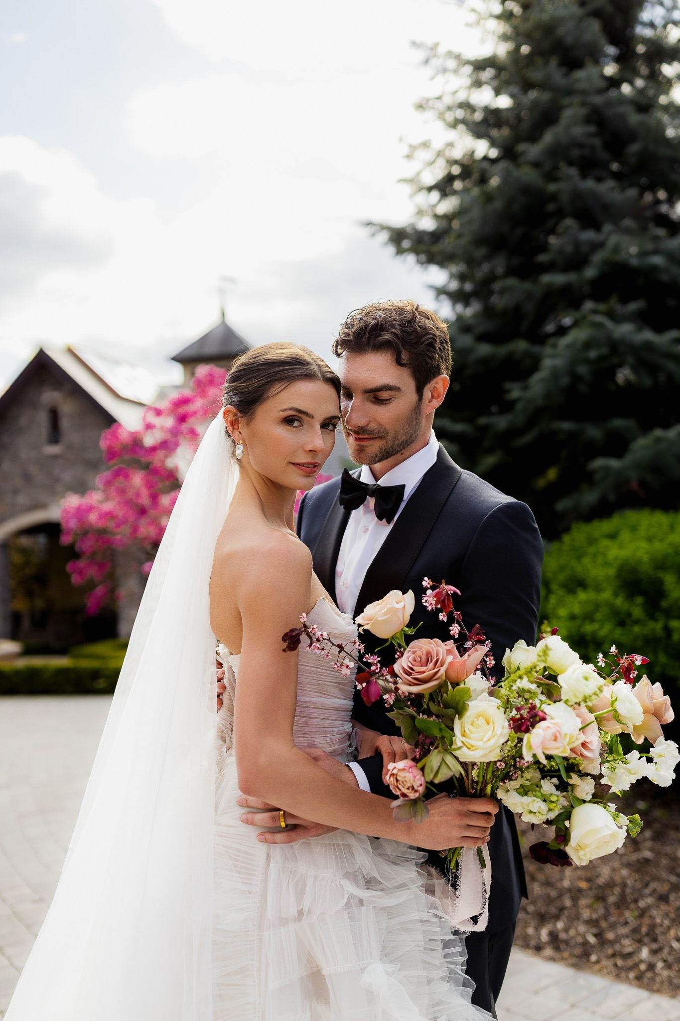 Bride and groom portrait at Chateau Okanagan in Kelowna British Columbia after their luxury wedding ceremony, captured by a professional.