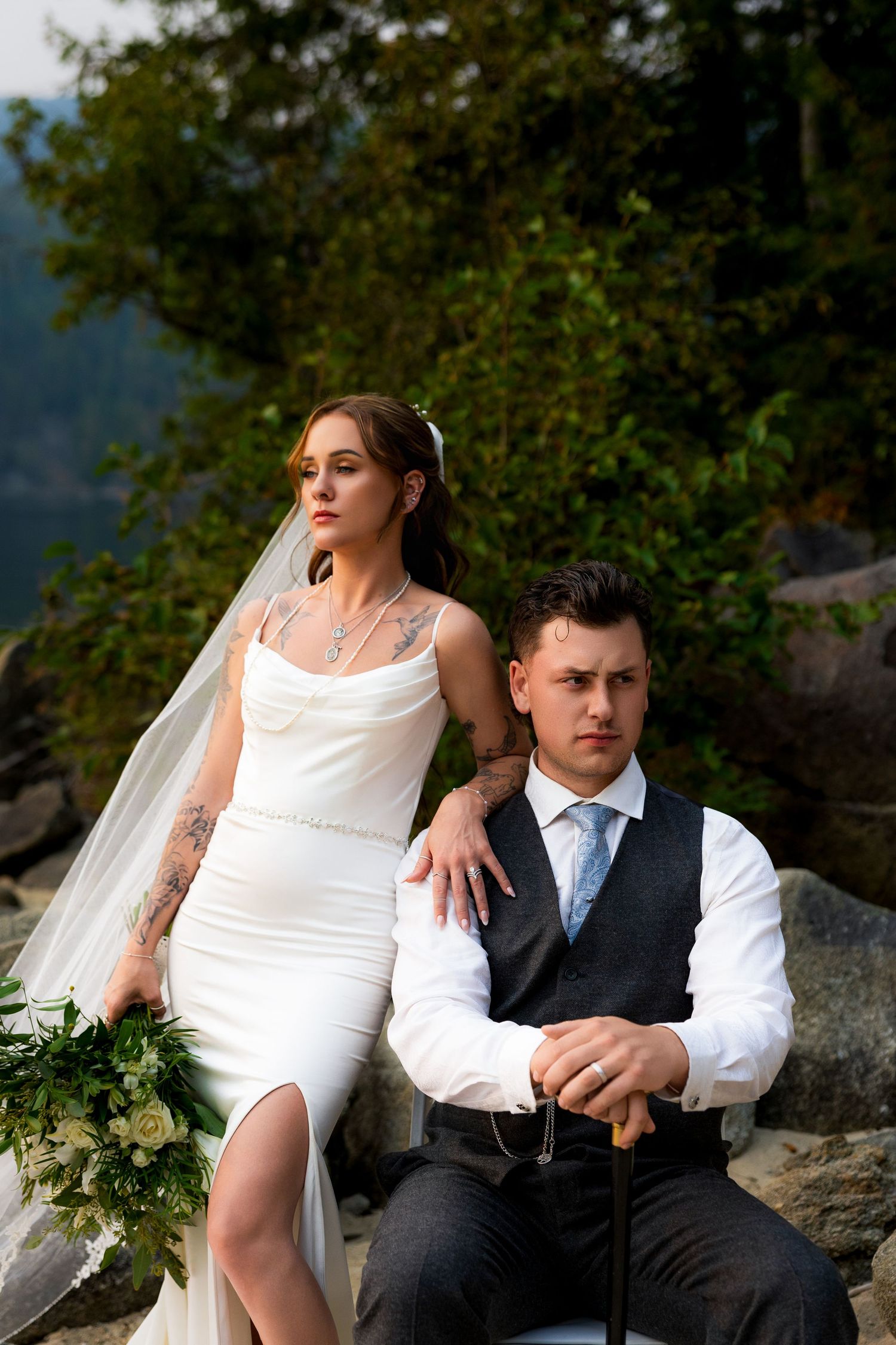 Moody luxury wedding photo of couple posing for portraits, capturing romantic, stylish, and editorial destination wedding photography.