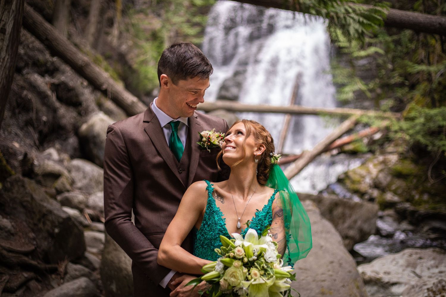 Elopement photo taken at Whitecroft Falls, near Sun Peaks BC.