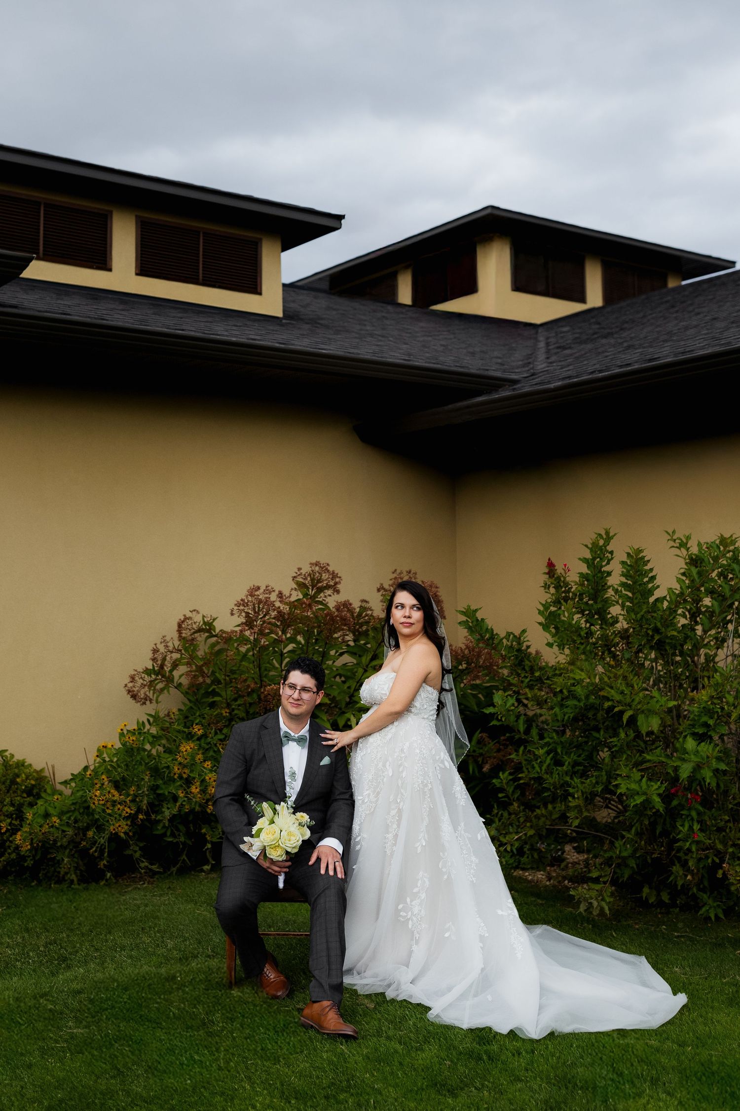 Romantic photo of bride and groom outside The Dunes Golf Course, capturing intimate, stylish, and luxury destination wedding photography.