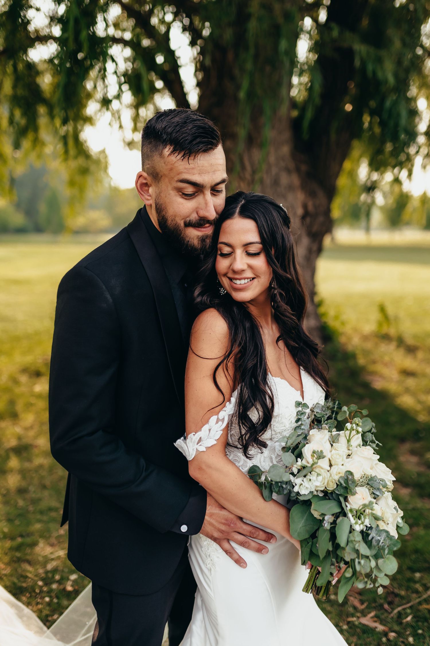 Intimate photograph of bride and groom together on a golf course in Hammond, Indiana