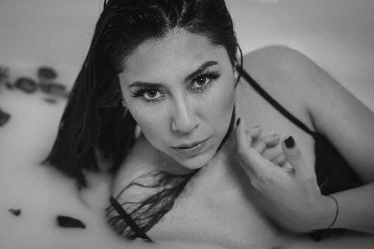 A collection of black and white vintage-style portrait photographs showing dramatic poses and expressions.