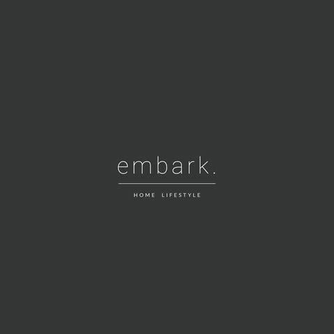 Minimalist dark gray website header design with embark logo text and navigation menu.