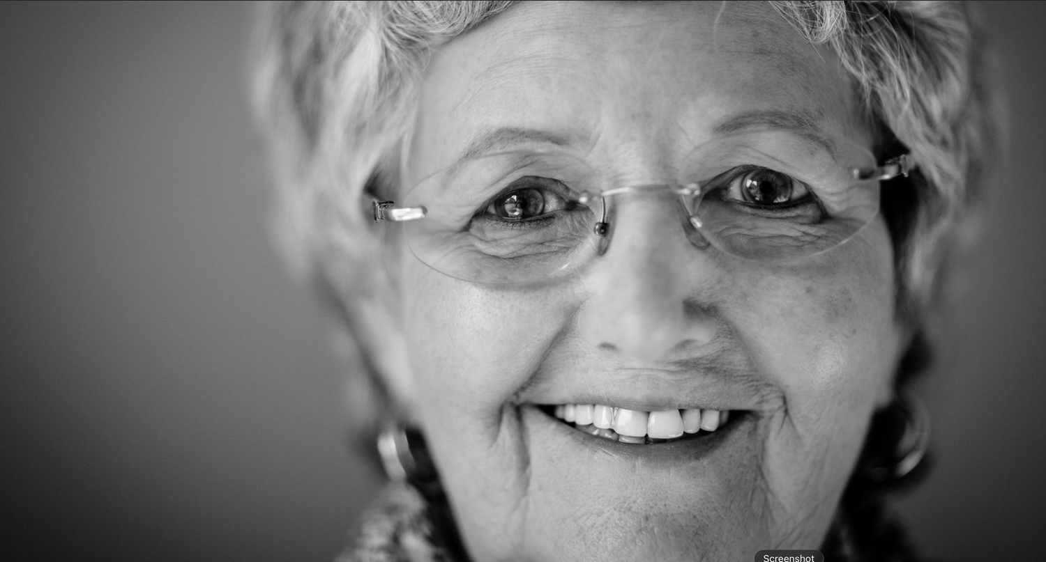 Black and white portrait series showing close up shots of eyes, smiles and facial expressions.