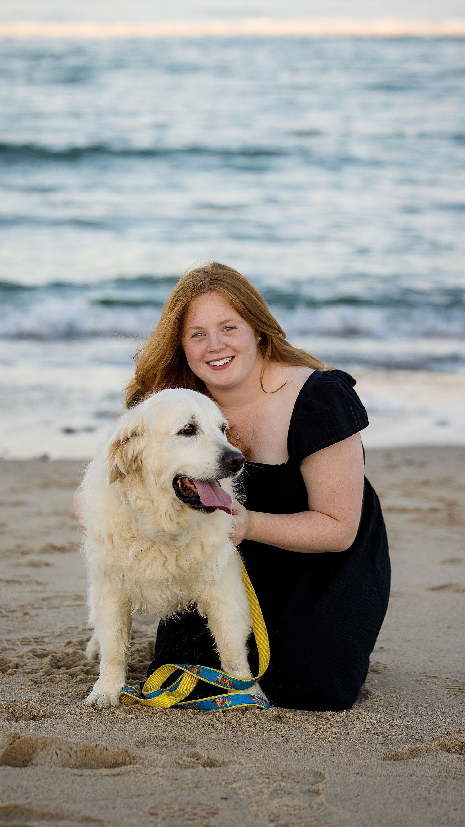 Campbell Mulligan with her dog on the beach
