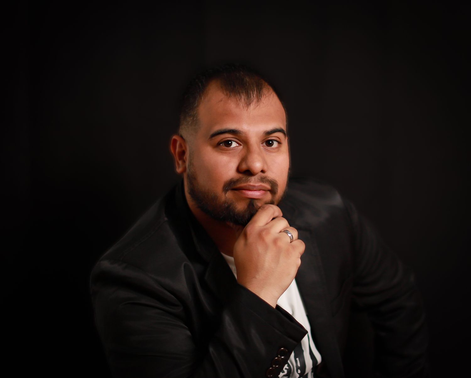 Bearded Guy taking portrait in suit