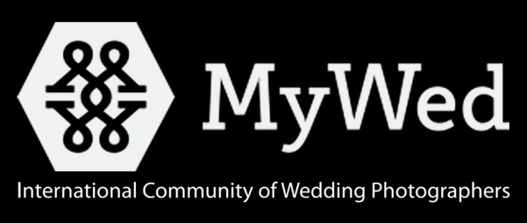 MyWed International Community of Wedding Photographers logo featuring a white hexagon emblem on a black background.