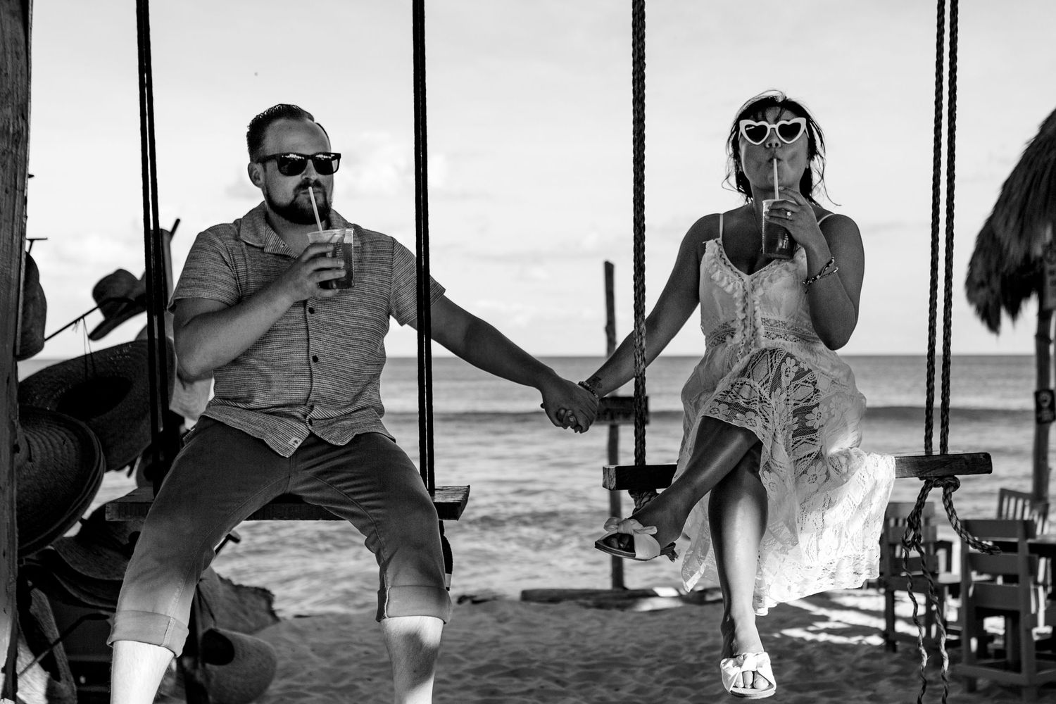 A black and white photo collage shows several people sitting and relaxing outdoors in beach chairs.