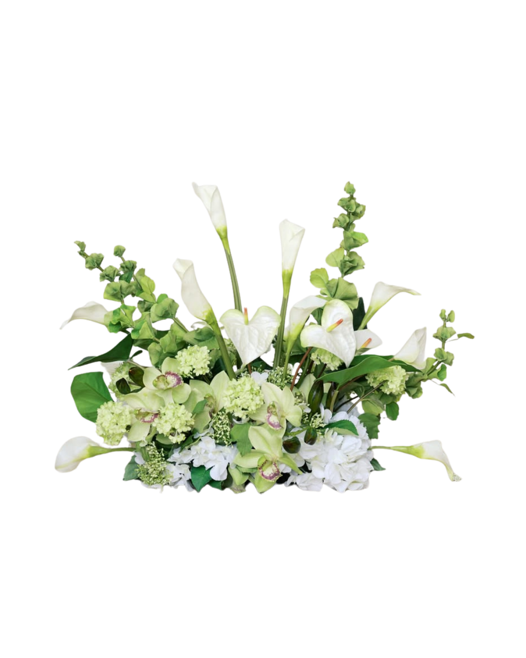 Elegant white floral arrangement with calla lilies, orchids, and green accents in a low centerpiece design.
