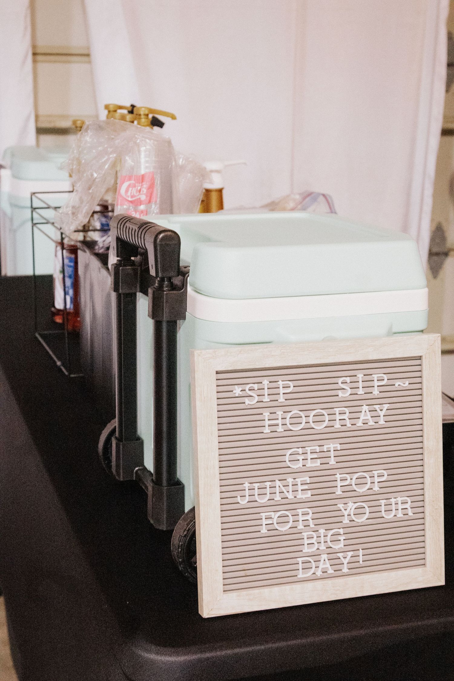 White letter boards with inspirational messages displayed on retail counter.