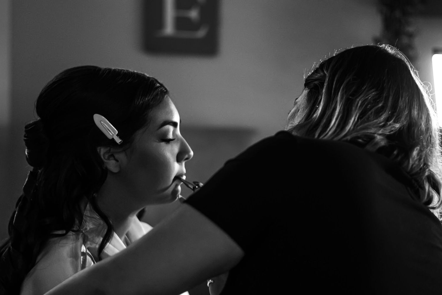 Artistic black and white profile portraits showing natural expressions. At a Quinceañera