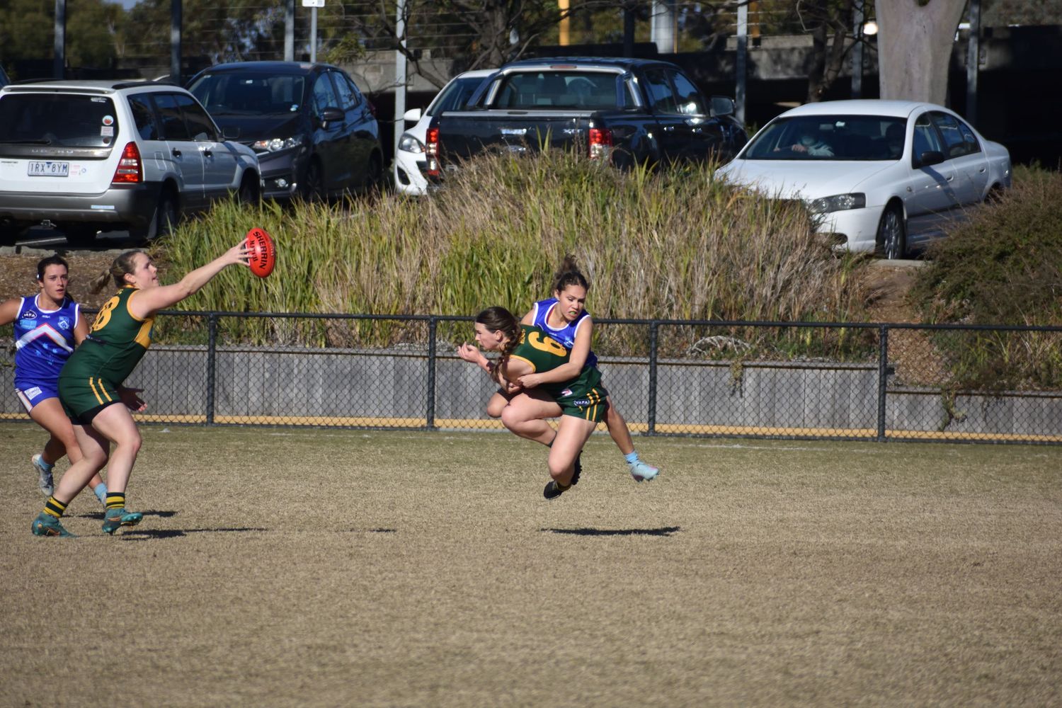 Tackling other player off the ground - sports photography