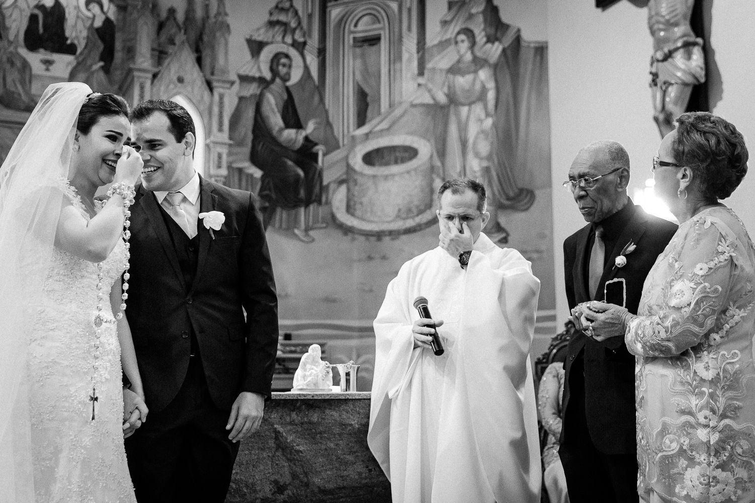 A collection of black and white wedding photographs showing couples during their ceremonies and celebrations.