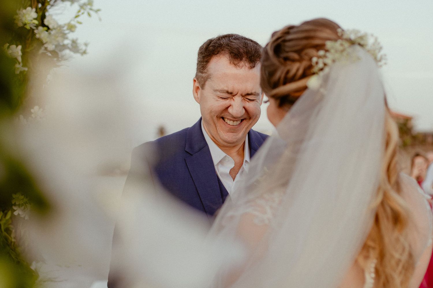 A series of candid emotional wedding moments showing joy and laughter during an outdoor celebration.