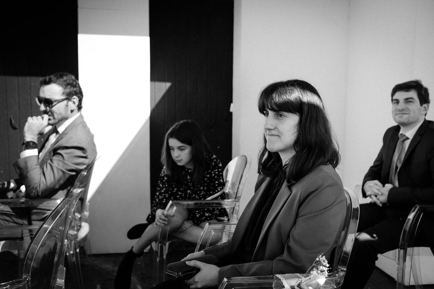 A series of black and white photographs showing musicians performing together in what appears to be a recording studio.