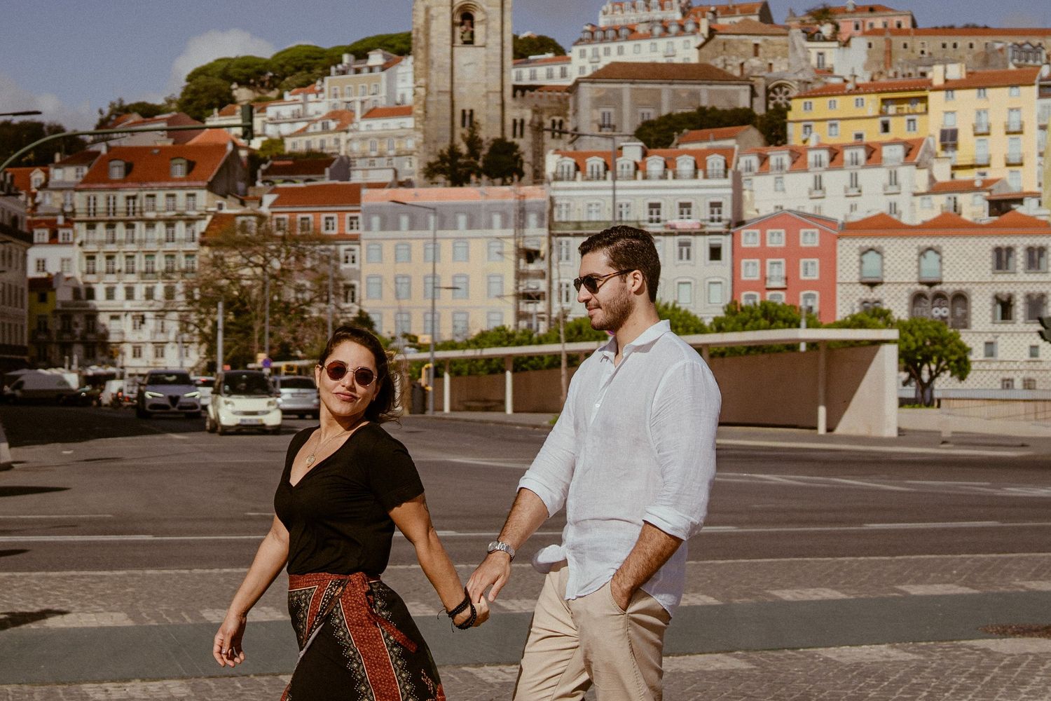 Six connected panoramic photos of cobblestone squares and colorful traditional architecture in Lisbon's historic district.