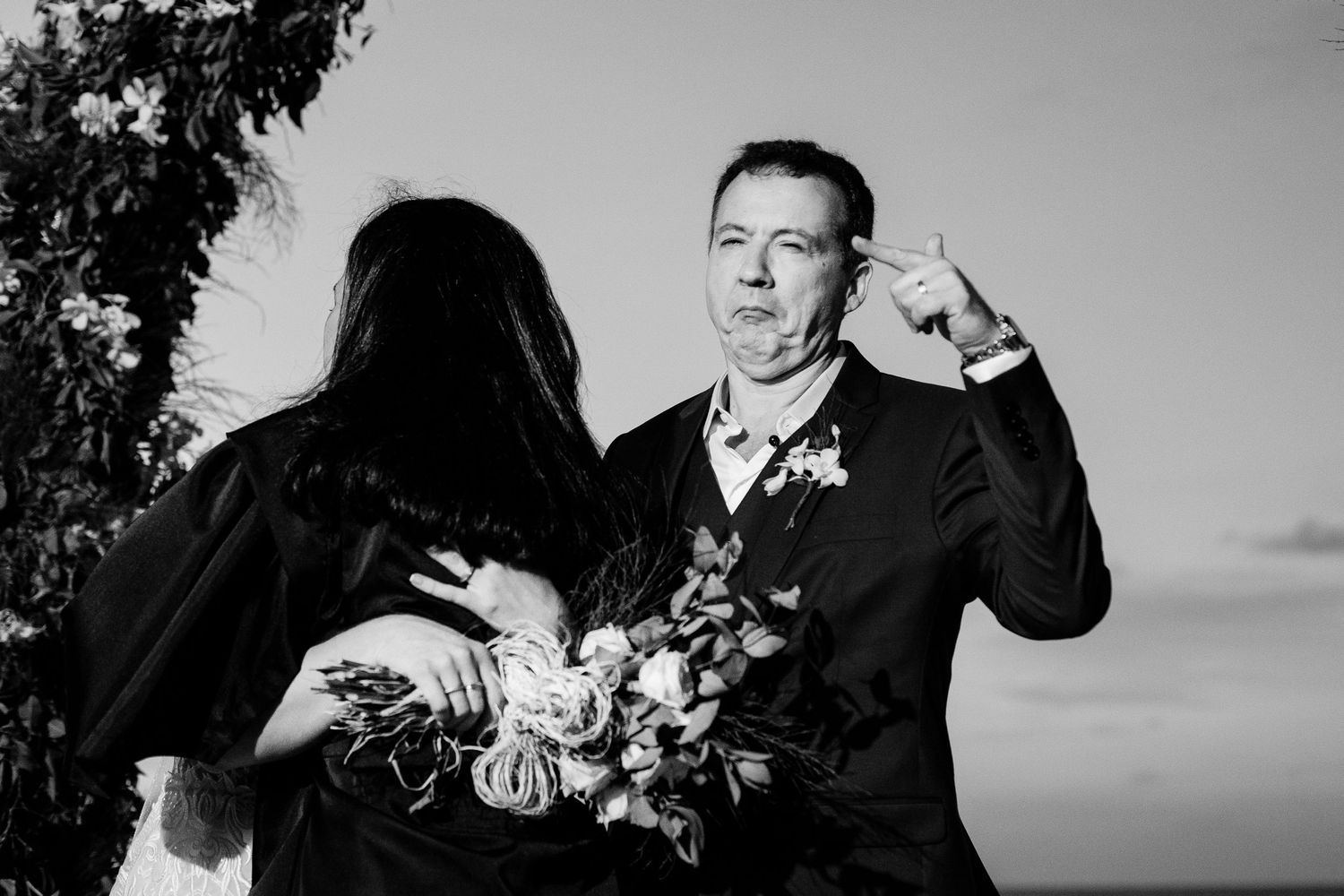 A romantic black and white photo series shows intimate couple portraits during their wedding celebration.