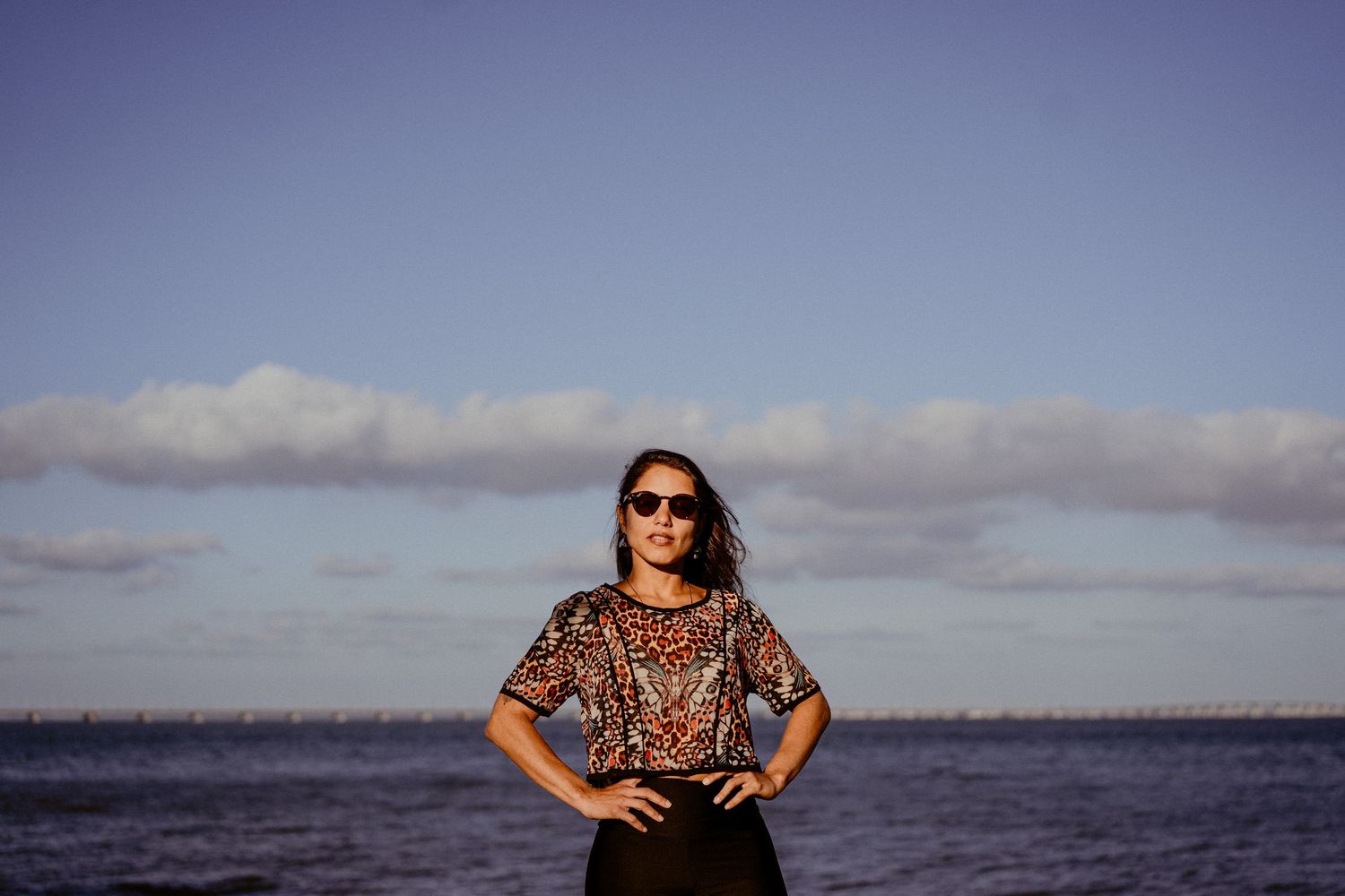 Scenic landscape photos with oceanfront views and cloudy skies.