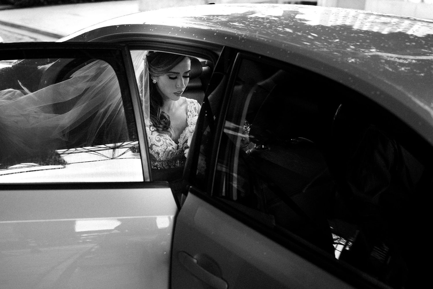 Black and white photographs showing details of an old Mercedes Benz vehicle at different angles.