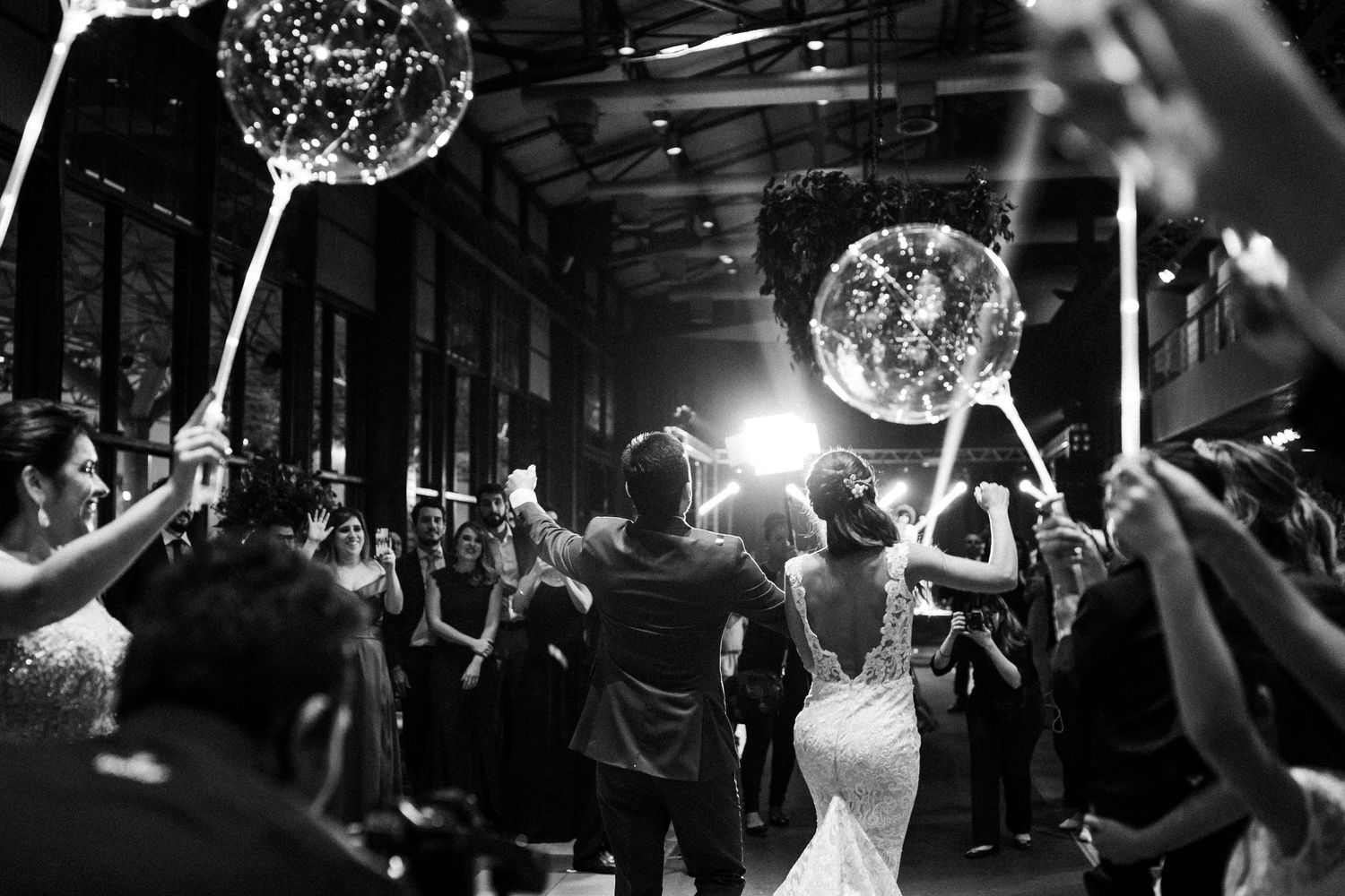 Wedding reception dance floor with sparkling disco balls creating a festive atmosphere.