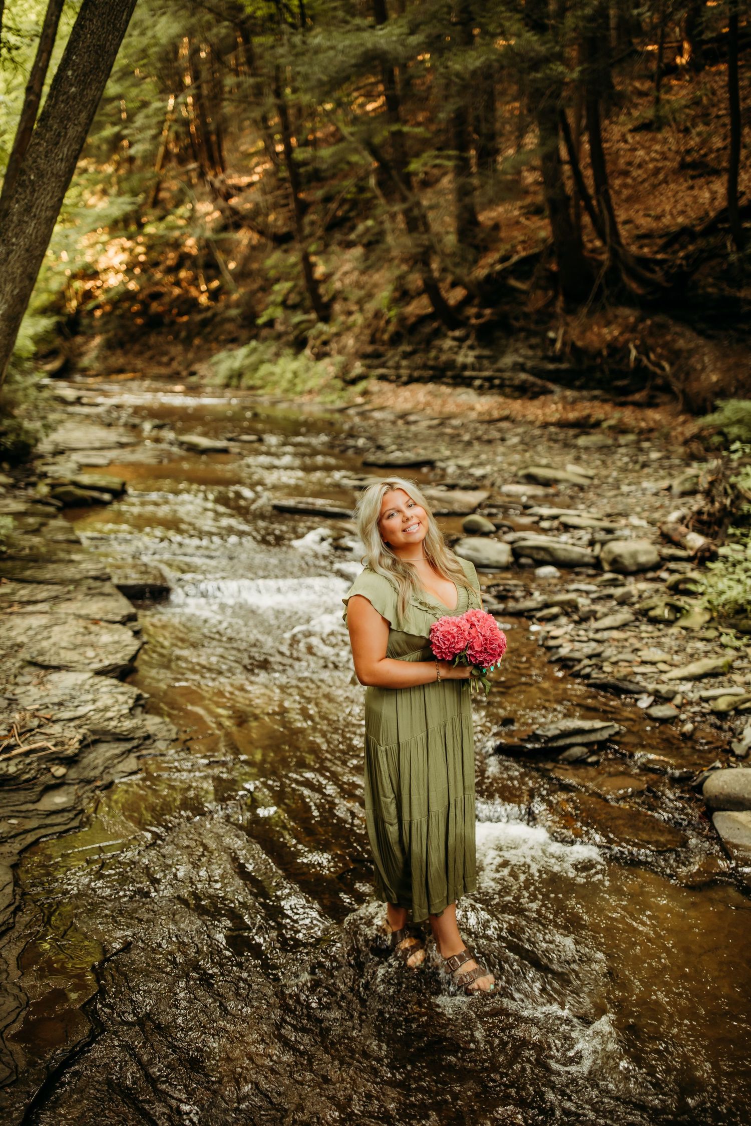 Senior girl photos in the creek at Letchworth State Park in Castile, NY