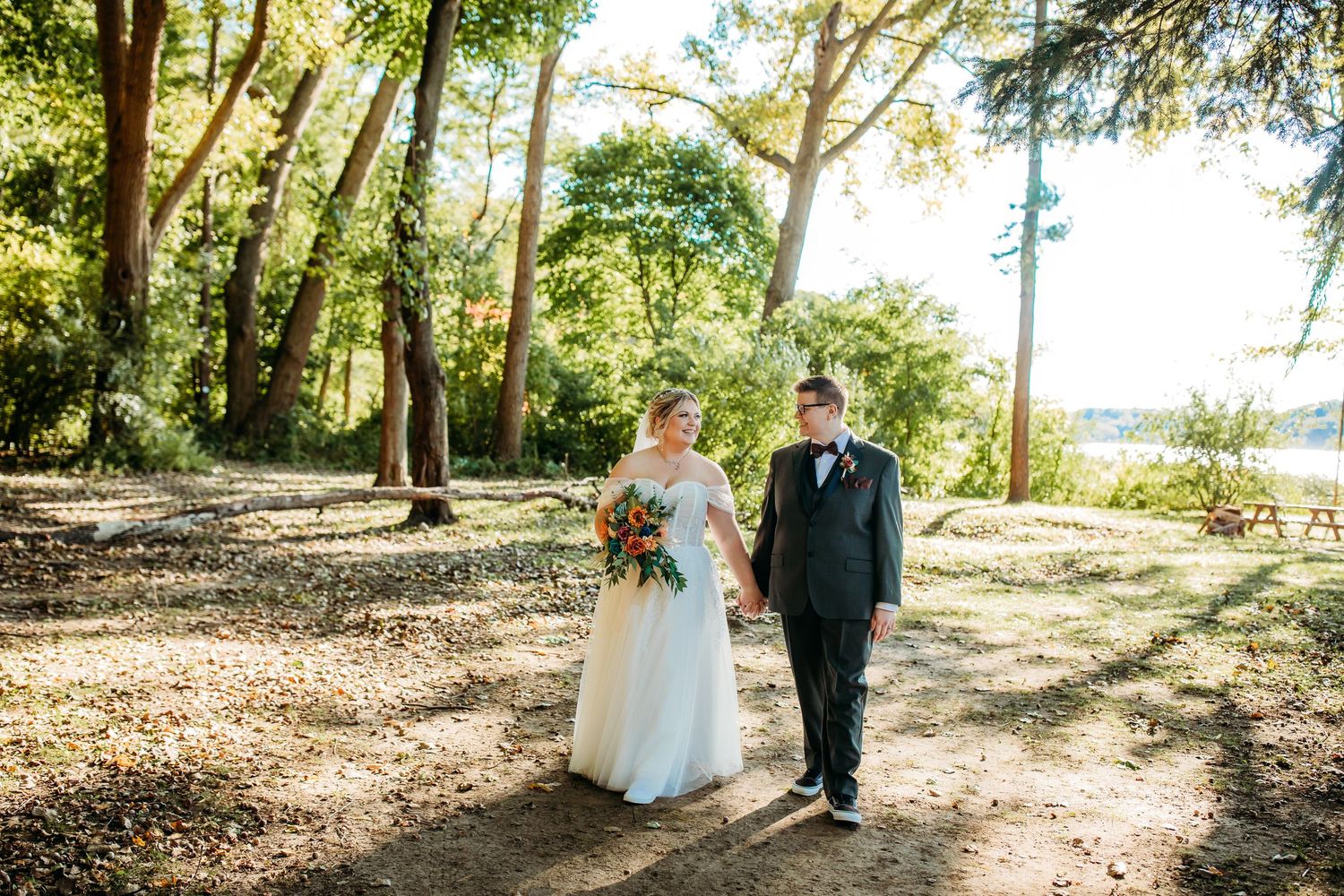 Bridal Portraits of Cindy and Ashley in front of the lake at Abraham Lincoln Lodge Venue.