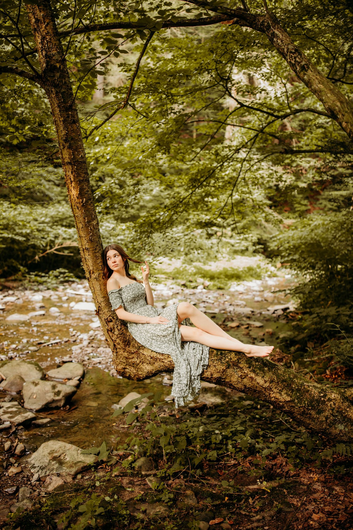 Senior girl photos in the creek at Letchworth State Park in Castile, NY