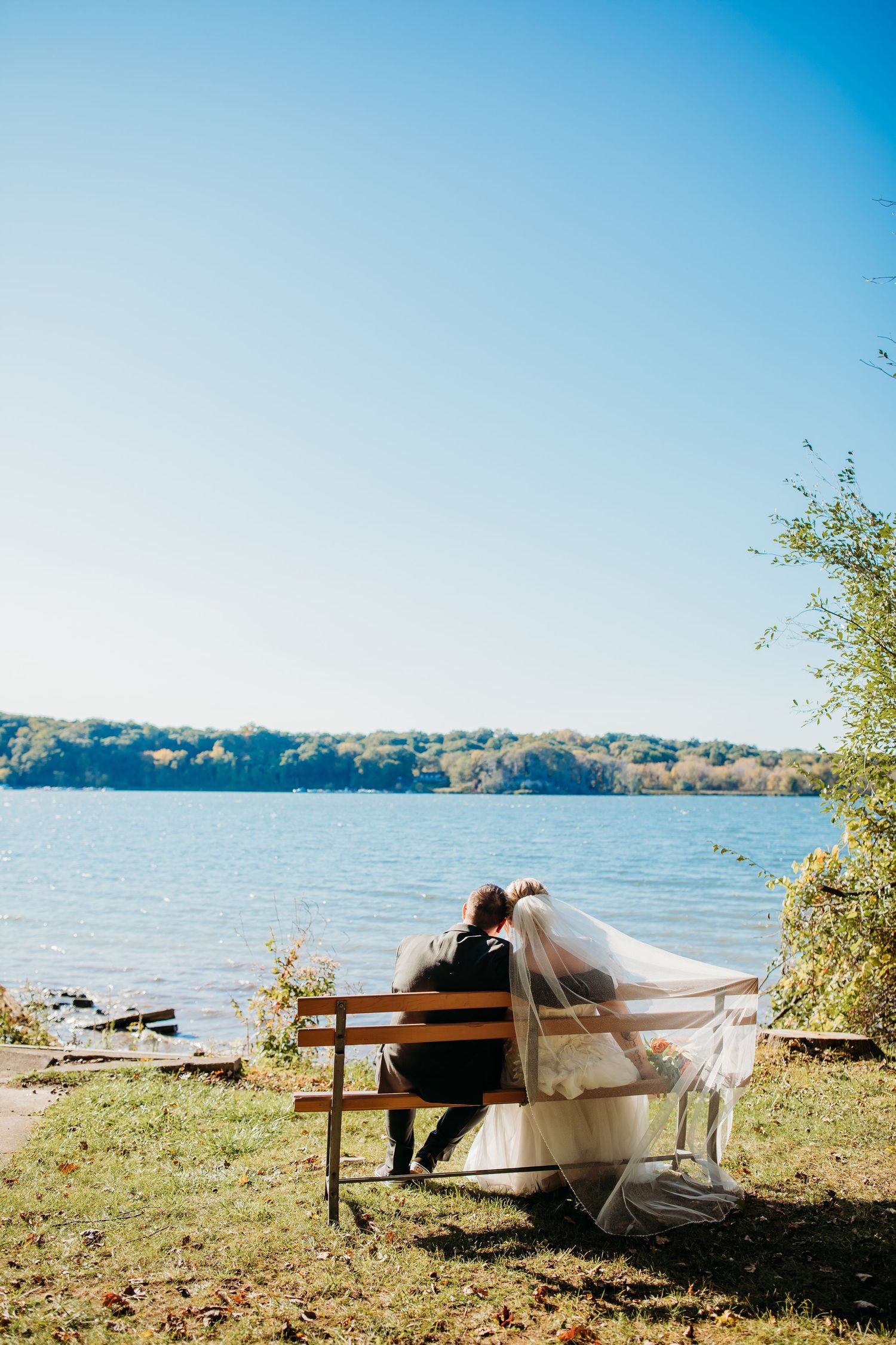 Bridal Portraits of Cindy and Ashley in front of the lake at Abraham Lincoln Lodge Venue.
