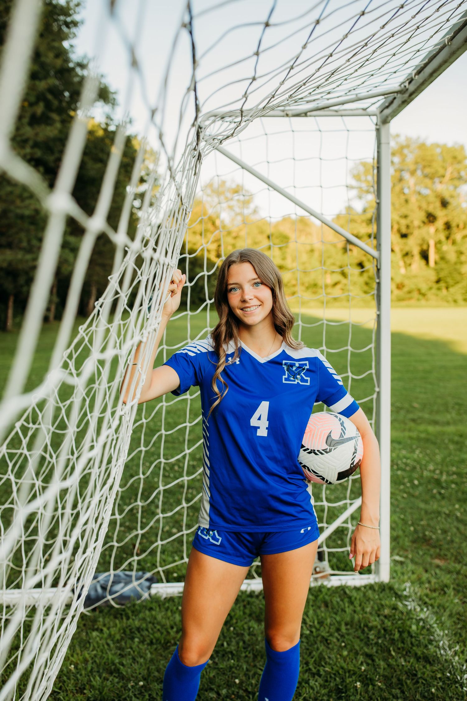 Senior girl sports photos in Kendall, NY