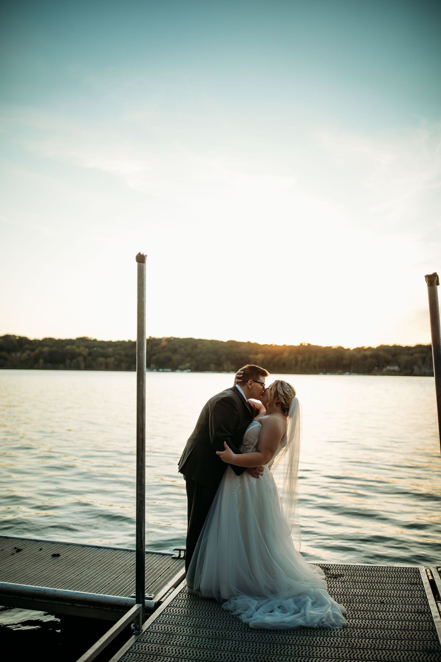 Bridal Portraits of Cindy and Ashley on the dock at Abraham Lincoln Lodge Venue.