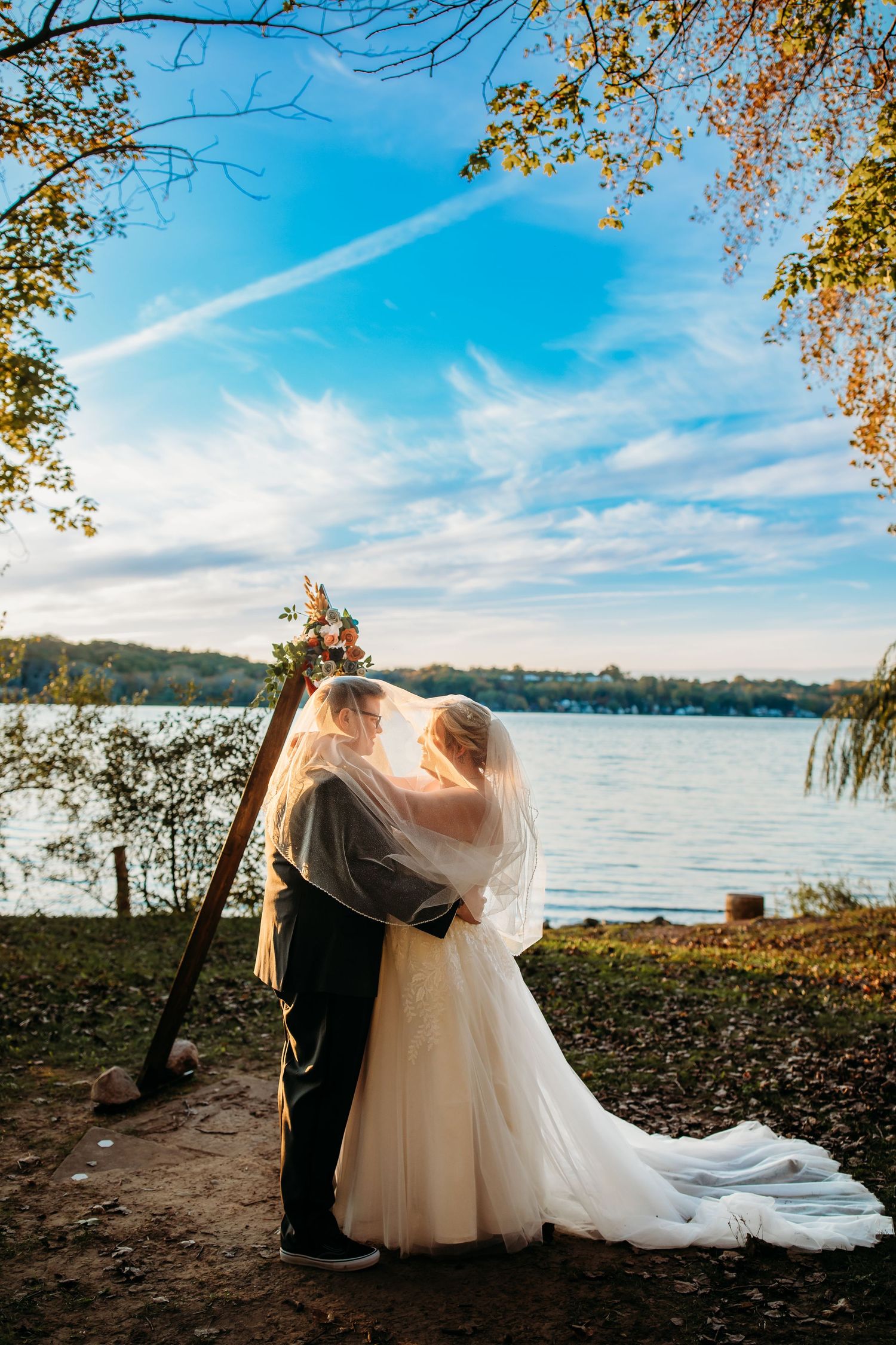 Bridal Portraits of Cindy and Ashley in front of the lake at Abraham Lincoln Lodge Venue.