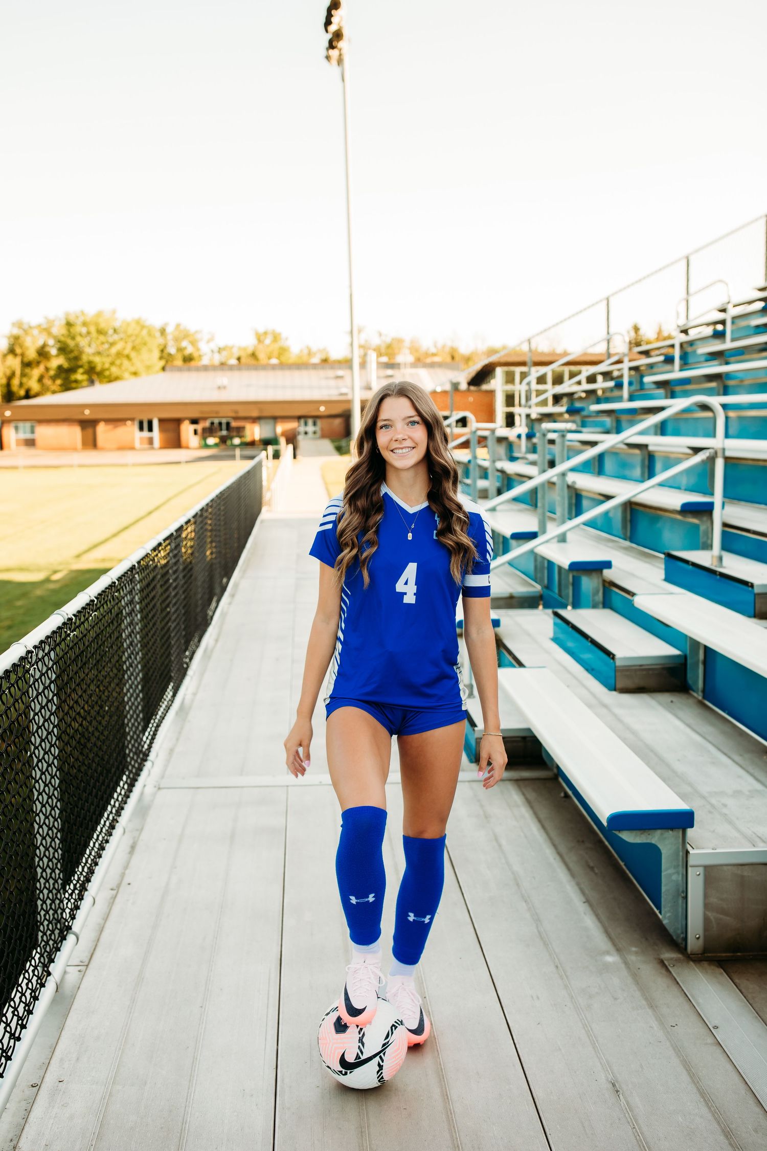 Senior girl sports photos in Kendall, NY