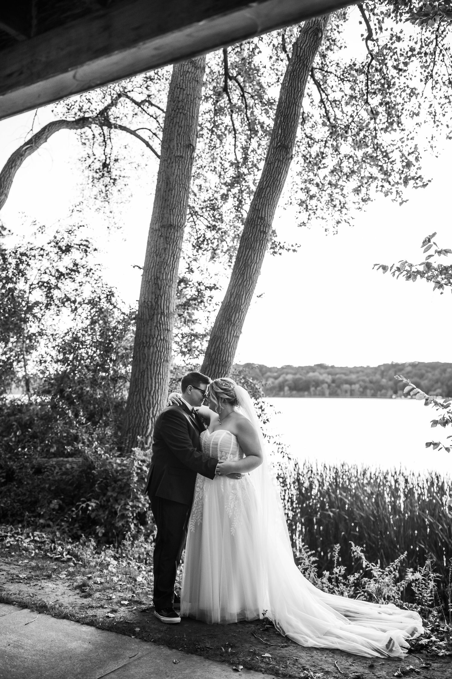 Bridal Portraits of Cindy and Ashley in front of the lake at Abraham Lincoln Lodge Venue.