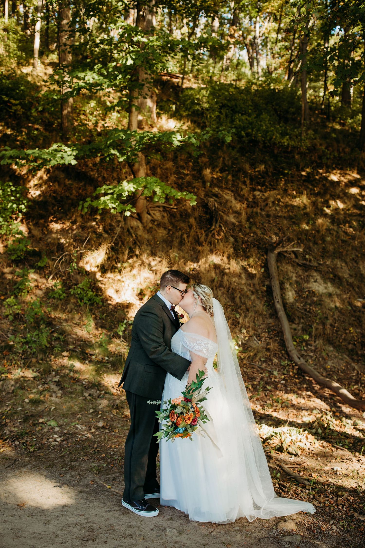 Bridal Portraits of Cindy and Ashley in front of the lake at Abraham Lincoln Lodge Venue.