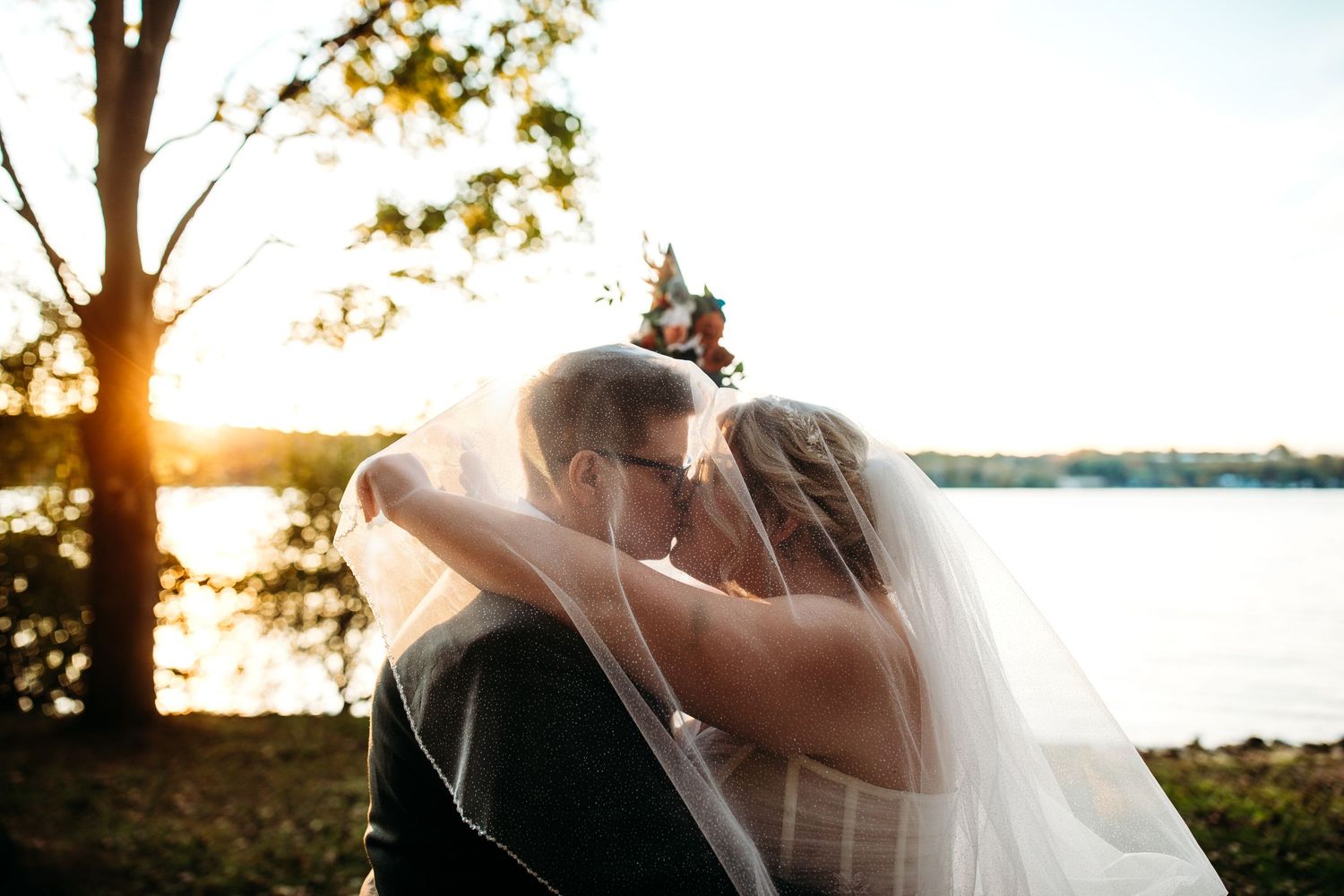 Bridal Portraits of Cindy and Ashley in front of the lake at Abraham Lincoln Lodge Venue.
