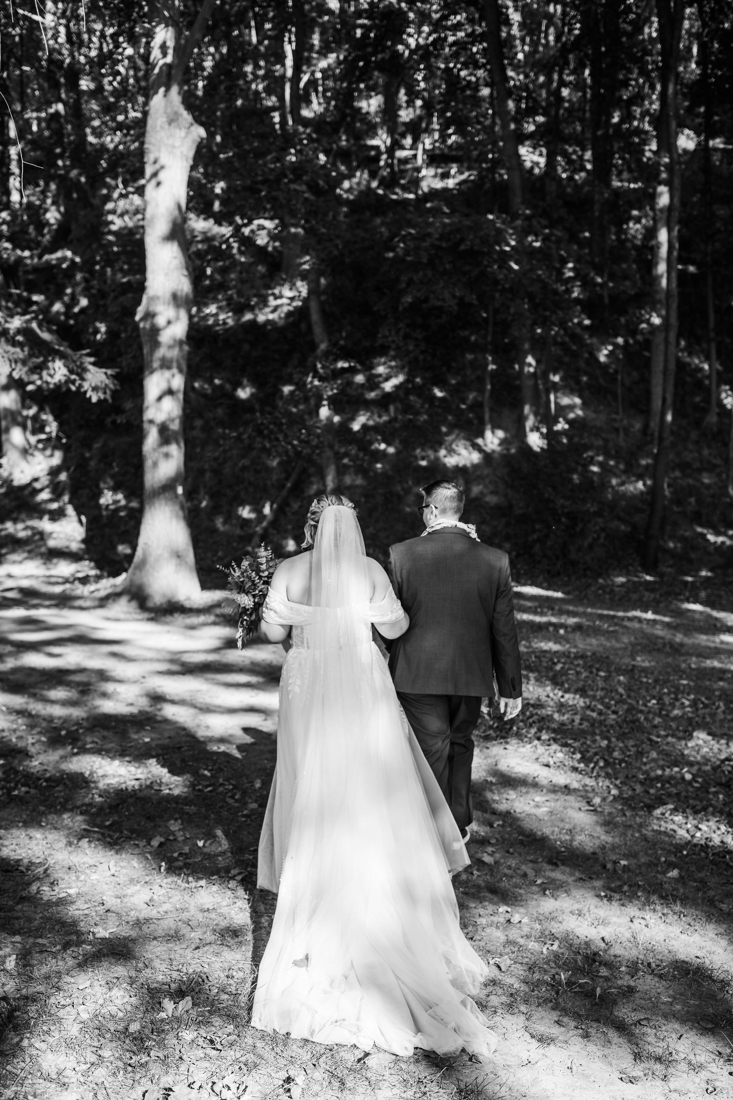 Cindy and Ashley walk back up the aisle after their wedding ceremony.