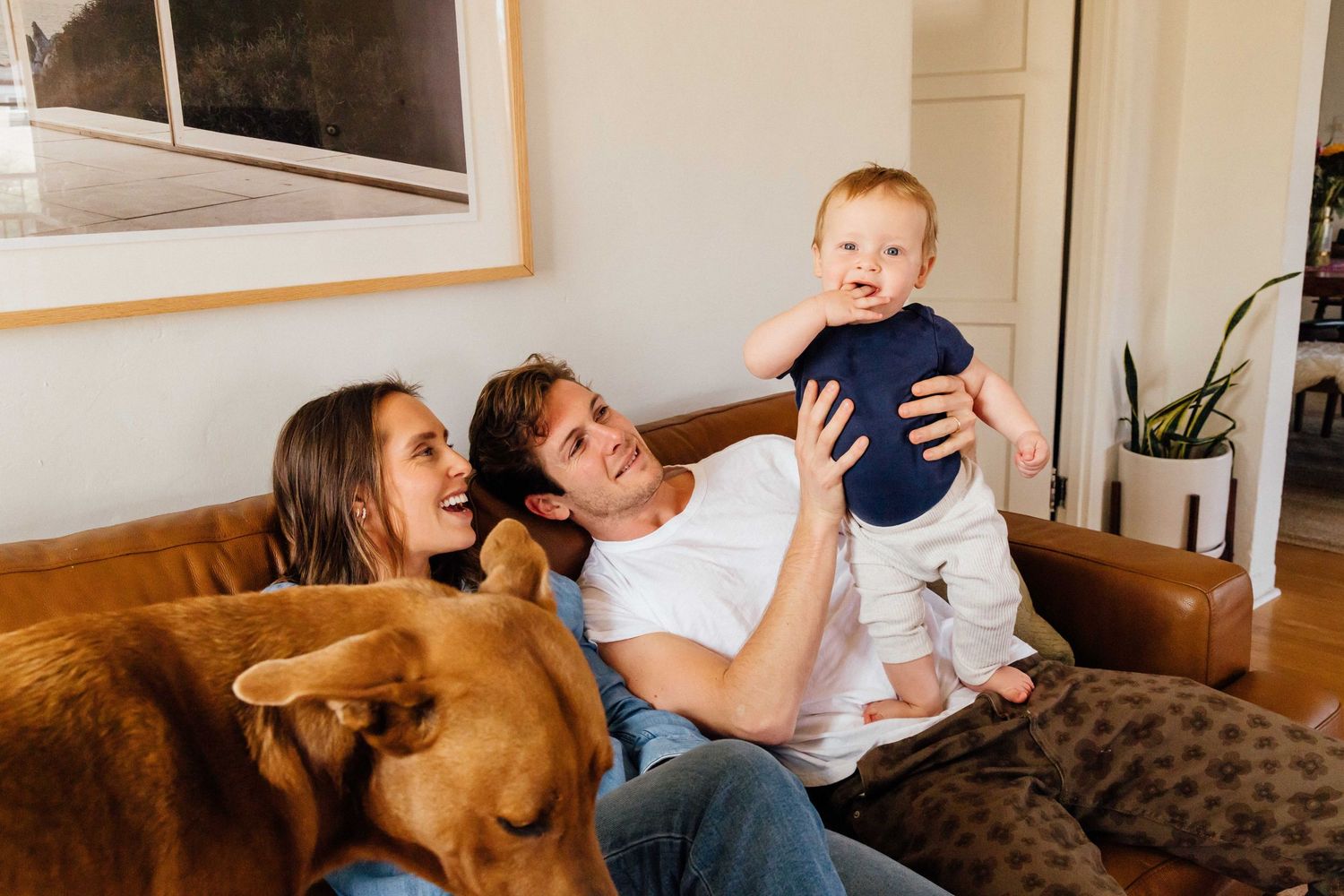 Documentary lifestyle portrait in natural light of LA family, mother, father & child by Los Angeles editorial photographer Phia Photography.