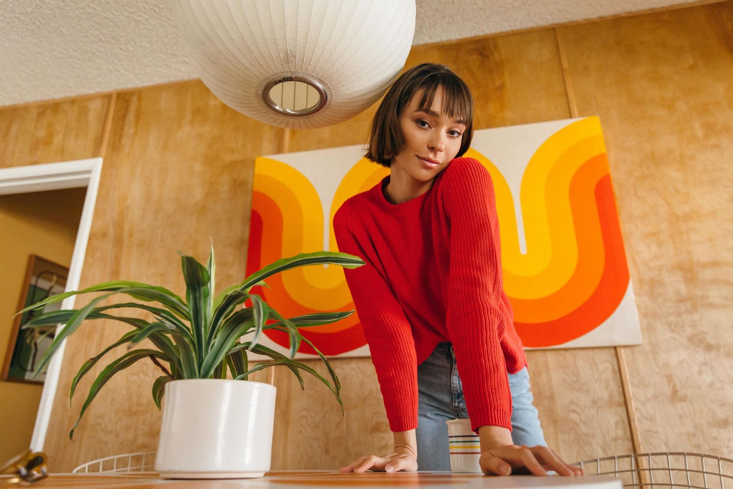 Lifestyle creative branding portrait of woman in natural light at vintage LA home by Los Angeles photographer Phia Photography.