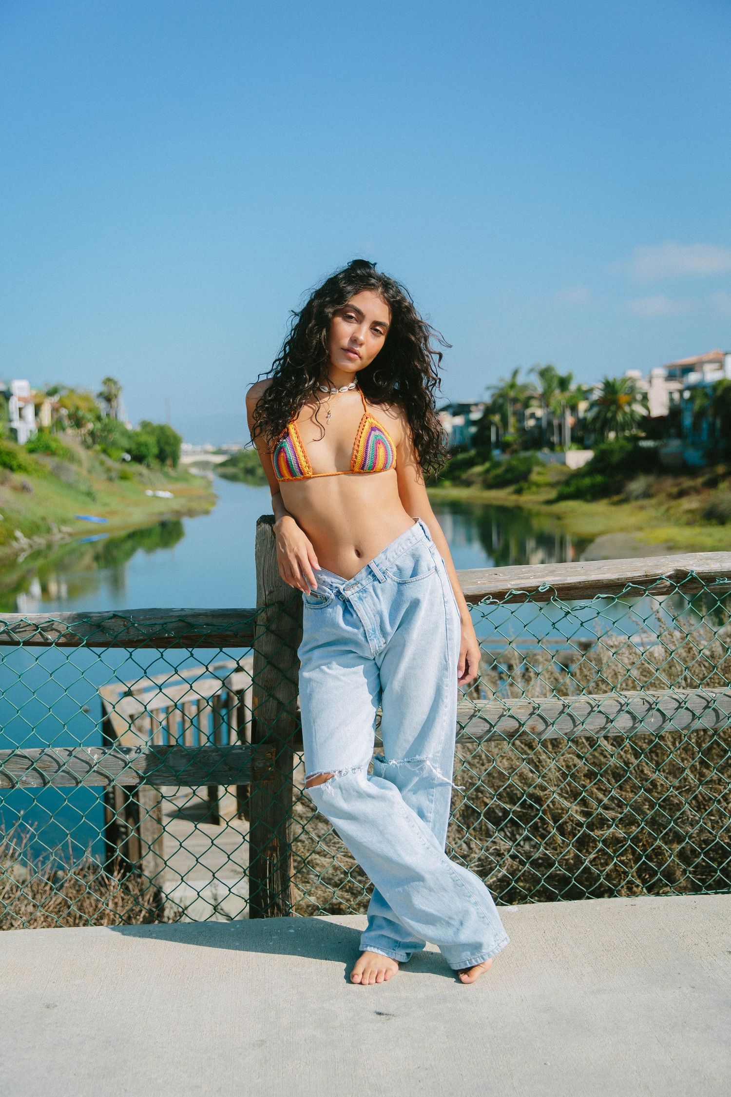 Model portfolio lifestyle photoshoot of woman naturally posed in Venice Beach natural light by Los Angeles photographer Phia Photography.