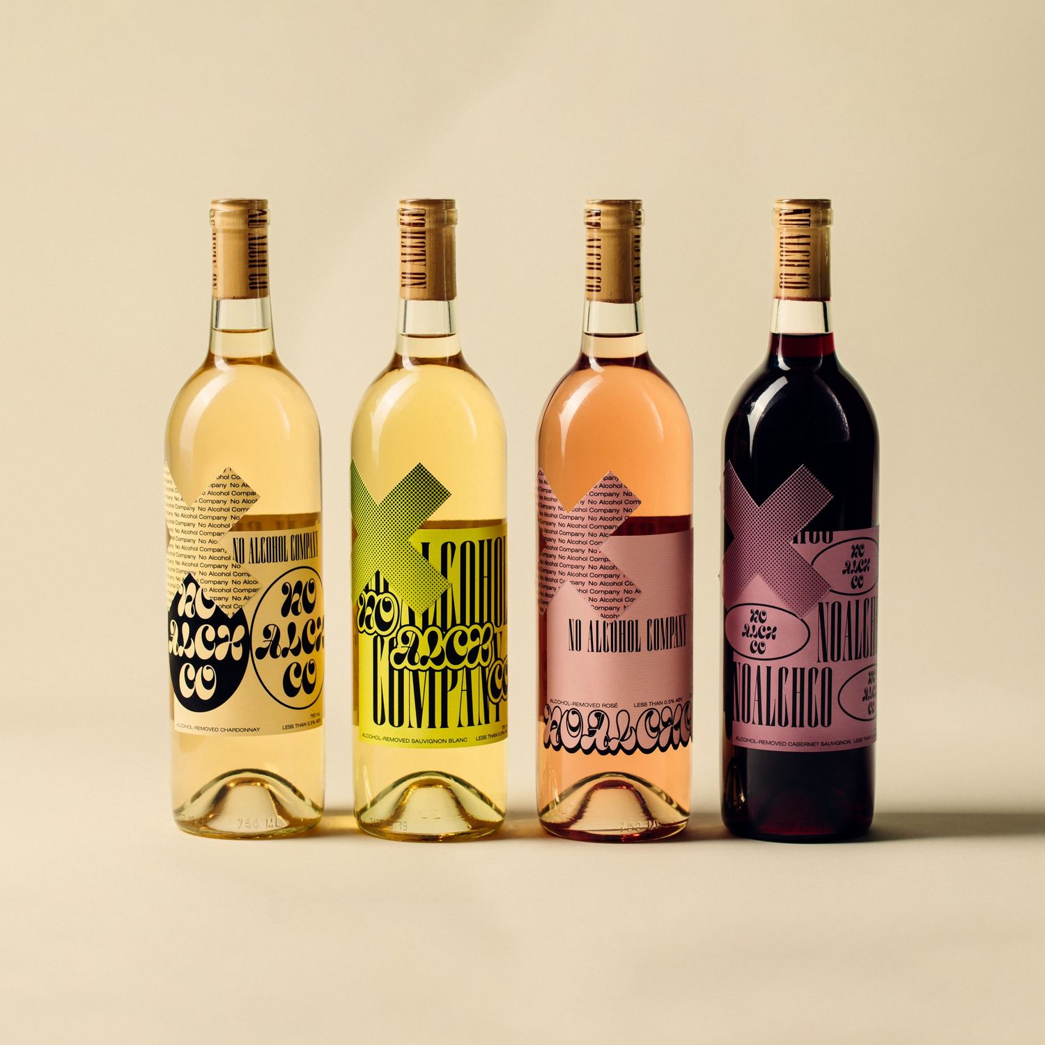 Brand product photos of non-alcoholic wine bottles in studio light by Los Angeles photographer Phia Photography.